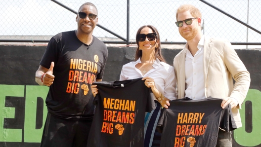 LAGOS, NIGERIA - MAY 12: (EDITORIAL USE ONLY)  Prince Harry, Duke of Sussex and Meghan, Duchess of Sussex visit Giants of Africa at Ilupeju Senior Grammar School on May 12, 2024 in Lagos, Nigeria. (Photo by Andrew Esiebo/Getty Images for The Archewell Foundation)