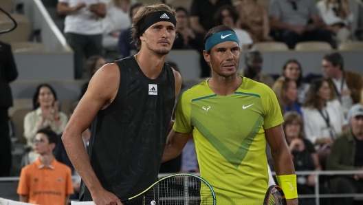 FILE - Spain's Rafael Nadal, right, and Germany's Alexander Zverev pose before their semifinal of the French Open tennis tournament at the Roland Garros stadium Friday, June 3, 2022 in Paris. Plenty of folks have vivid recollections of seeing Nadal display his relentless excellence on a tennis court. That includes the many players who have been on the other side of the net for at least one of his 1,299 professional matches.(AP Photo/Michel Euler, File)