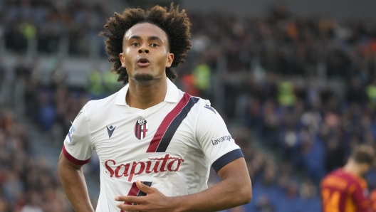 Bologna's Joshua Zirkzee celebrates after scoring the second goal against Roma during the Italian Serie A soccer match between Roma and Bologna at Rome's Olympic Stadium, Monday, April 22, 2024. (AP Photo/Gregorio Borgia)