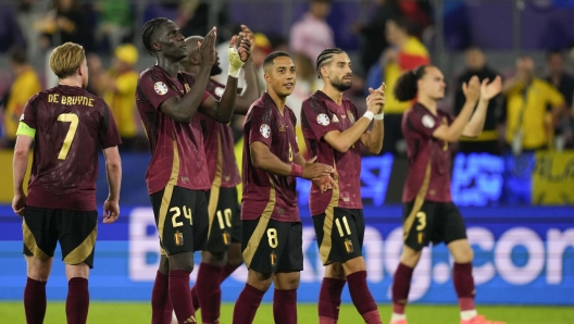 Belgium players greet fans after a Group E match between Belgium and Romania at the Euro 2024 soccer tournament in Cologne, Germany, Saturday, June 22, 2024. (AP Photo/Andreea Alexandru)