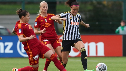 BIELLA, ITALY - MAY 13: Barbara Bonansea of Juventus competes for the ball with Elena Linari and Anja Sonstevold of AS Roma during the Women Serie A match between Juventus and AS Roma on May 13, 2024 in Biella, Italy. (Photo by Marco Luzzani/Getty Images)