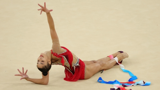 epa11540057 Sofia Raffaeli of Italy performs in the Ribbon routine of the Individual All-Around Final during the Rhythmic Gymnastics competitions in the Paris 2024 Olympic Games, at the Bercy Arena in Paris, France, 09 August 2024.  EPA/TERESA SUAREZ