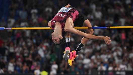 Italy's Gianmarco Tamberi competes in the men's high jump event of the Diamond League athletics meeting at the Olympic stadium in Rome on August 30, 2024. (Photo by Tiziana FABI / AFP)