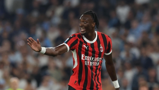 ROME, ITALY - AUGUST 31: Tammy Abraham of AC Milan reacts during the Serie match between Lazio and Milan at Stadio Olimpico on August 31, 2024 in Rome, Italy. (Photo by Claudio Villa/AC Milan via Getty Images)