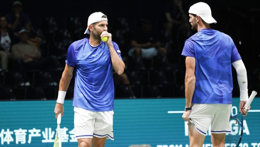 Italian double tennis team Simone Bolelli and Andrea Vavassori in action against Brasilian double tennis team Rafael Matos and Marcelo Melo during the match of Davis Cup Final Group Stage at Unipol Arena in Casalecchio (Bologna) Italy, 11 September 2024. ANSA /ELISABETTA BARACCHI