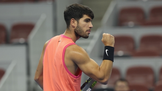 BEIJING, CHINA - SEPTEMBER 29: Carlos Alcaraz of Spain reacts in the Men's Singles second round match against Tallon Griekspoor of Netherlands during day 7 of the 2024 China Open at National Tennis Center on September 29, 2024 in Beijing, China. (Photo by Lintao Zhang/Getty Images)