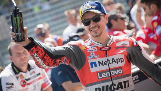 SPIELBERG, AUSTRIA - AUGUST 12:  Jorge Lorenzo of Spain and Ducati Team celebrates the victory under the podium at the end of the MotoGP race during the MotoGp of Austria - Race at Red Bull Ring on August 12, 2018 in Spielberg, Austria.  (Photo by Mirco Lazzari gp/Getty Images)