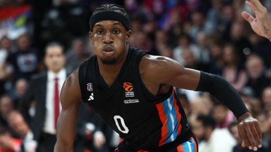 Paris' US Point Guard #0 TJ Shorts dribbles during the Euroleague basketball match between Paris Basketball and Crvena Zvezda Meridianbet Belgrade at the Adidas Arena in Paris, on October 4, 2024. (Photo by Anne-Christine POUJOULAT / AFP)