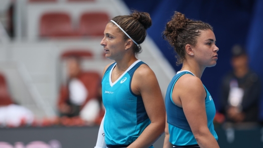 BEIJING, CHINA - OCTOBER 04: Sara Errani and Jasmine Paolini of Italy react during the Women's Doubles Quarterfinal match against Beatriz Haddad Maia of Brazil and Laura Siegemund of Germany on Day 12 of the China Open at National Tennis Center on October 04, 2024 in Beijing, China. (Photo by Emmanuel Wong/Getty Images)