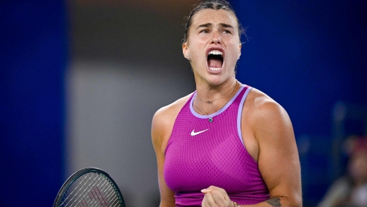 Belarus's Aryna Sabalenka reacts after winnning a point against Chinas Zheng Qinwen during their womens singles final match at the Wuhan Open tennis tournament in Wuhan, China's Hubei province on October 13, 2024. (Photo by WANG Zhao / AFP)