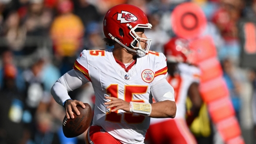 CHARLOTTE, NORTH CAROLINA - NOVEMBER 24: Quarterback Patrick Mahomes #15 of the Kansas City Chiefs throws a pass during the second quarter against the Carolina Panthers at Bank of America Stadium on November 24, 2024 in Charlotte, North Carolina.   Matt Kelley/Getty Images/AFP (Photo by Matt Kelley / GETTY IMAGES NORTH AMERICA / Getty Images via AFP)