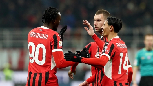 MILAN, ITALY - DECEMBER 03: Tammy Abraham of AC Milan celebrates scoring his team's sixth goal during the Coppa Italia match between AC Milan and Sassuolo at Stadio Giuseppe Meazza on December 03, 2024 in Milan, Italy. (Photo by Marco Luzzani/Getty Images)