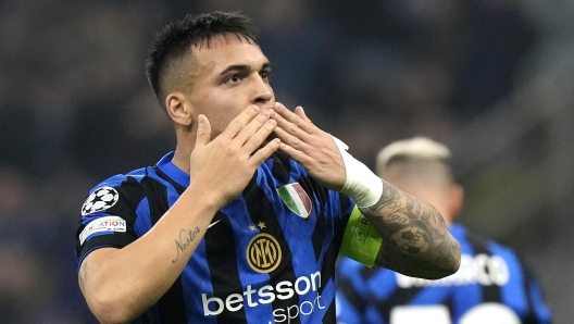 Inter Milan's Lautaro Martinez celebrates after scoring against Monaco during a Champions League soccer match between Inter Milan and Monaco, at the San Siro stadium in Milan, Italy, Wednesday, Jan. 29, 2025. (AP Photo/Luca Bruno)