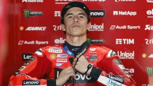 epa11931616 Ducati Lenovo Team rider Marc Marquez of Spain prepares in the paddock during the MotoGP free practice 2 of the Motorcycling Grand Prix of Thailand at Chang International Circuit, Buriram province, Thailand, 01 March 2025.  EPA/RUNGROJ YONGRIT