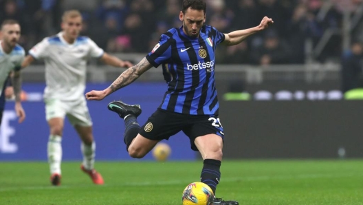 Hakan Calhanoglu scoring a penalty for Inter Milan