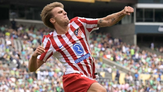 TOPSHOT - Atletico Madrid's Spanish midfielder #08 Pablo Barrios celebrates scoring his team's first goal during the FIFA Club World Cup 2025 Group B football match between US Seattle Sounders and Spain's Atletico de Madrid at the Lumen Field stadium in Seattle on June 19, 2025. (Photo by JUAN MABROMATA / AFP)