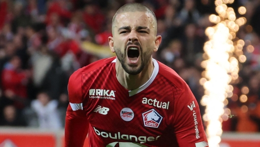 Lille`s Kosovar midfielder #23 Edon Zhegrova celebrates after scoring a goal during the French L1 football match between Lille LOSC and RC Lens at Stade Pierre-Mauroy in Villeneuve-d`Ascq, northern France on March 29, 2024. (Photo by DENIS CHARLET / AFP)