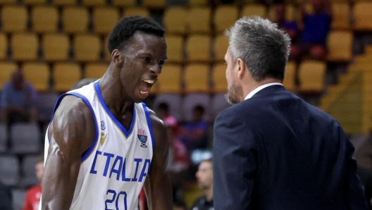 Saliou Niang and Coach Gianmarco Pozzecco