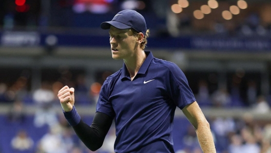 Jannik Sinner celebrates a point against Lorenzo Musetti during their Men`s Quarterfinal match at the 2025 US Open.