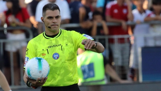 Referee wearing a camera headset during a football match