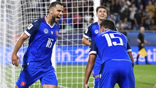 Slovakia`s David Hancko celebrates after scoring against Germany