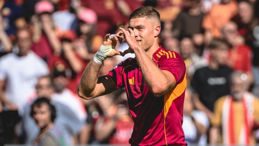 AS Roma player Artem Dovbyk celebrates a goal.