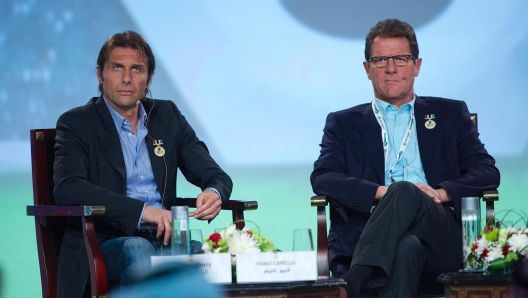 Manager of the Russian national team Italian Fabio Capello (R) with head coach of the Italian team Juventus, Antonio Conte, during the second session at 8th edition of Dubai International Sports Conference in Gulf emirate of Dubai, United Arab Emirates, 28 December 2013. 
ANSA/ALI HAIDER