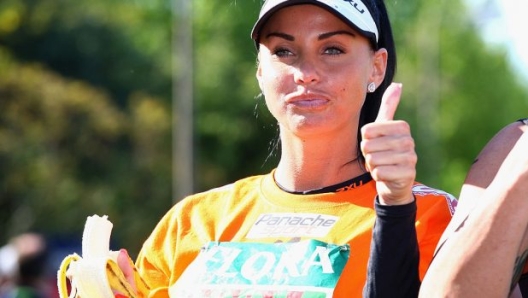 LONDON - APRIL 26: Katie Price poses before the 2009 Flora London Marathon on April 26, 2009 in London, England. (Photo by Gareth Cattermole/Getty Images)