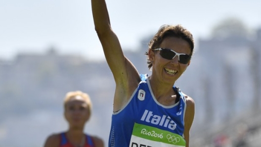 Catherine Bertone celebra il suo personalissimo traguardo olimpico. Bravissima - AFP