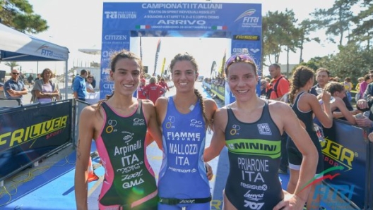 Arpinelli, Mallozzi, Priarone sul podio dei Tricolori di Lignano (foto Ballabio/FITRI)