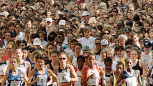 A field of over 6500 women, including eventual winner Catherine Ndereba of Kenya, front row far right, fills Beacon Street Sunday, Oct. 8, 2000, in Boston at the start of the 24th Annual Tufts 10-kilometer race for women. Ndereba, the winner of the 2000 Boston Marathon, won the Tufts race with a time of 32:46. (AP Photo/Christopher Pfuhl)