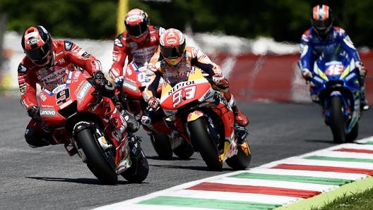 Danilo Petrucci davanti a Marquez, Dovizioso e Rins. Afp