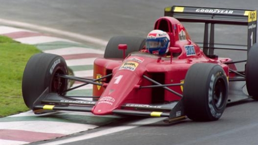 Alain Prost sulla rossa nel 1990. Afp