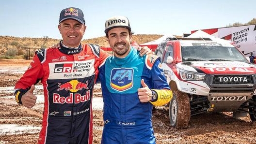 Fernando Alonso al rally del Marocco al fianco del vincitore il sudafricano Giniel de Villiers