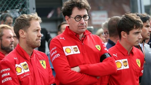 Da sinistra Sebastian Vettel, Mattia Binotto e Charles Leclerc. Lapresse