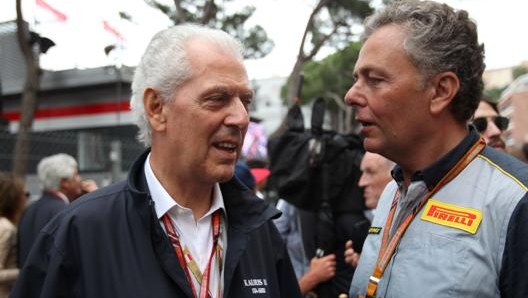 Marco Tronchetti Provera (a sin) con Mario Isola, responsabile in pista di Pirelli in F.1. Lapresse