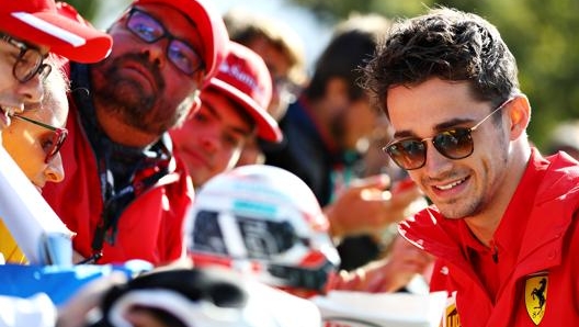 Charles Leclerc, 22 anni, firma autografi a Monza. Getty