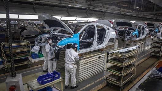 Catena di montaggio in un impianto Dongfeng a Wuhan. Epa