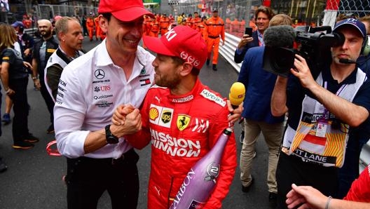 Toto Wolff  e Seb Vettel.