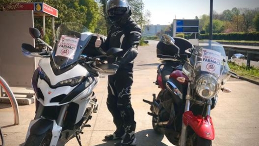 Due volontari di Angeli in moto pronti all’azione