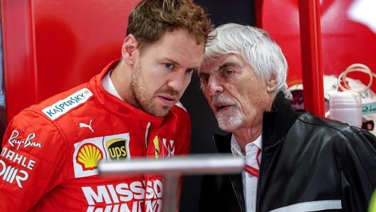 Sebastian Vettel con Bernie Ecclestone. Epa