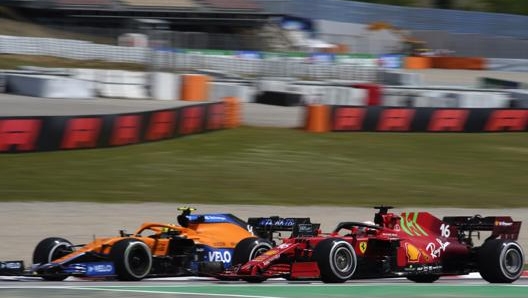 Lando Norris con Charles Leclerc. LaPresse