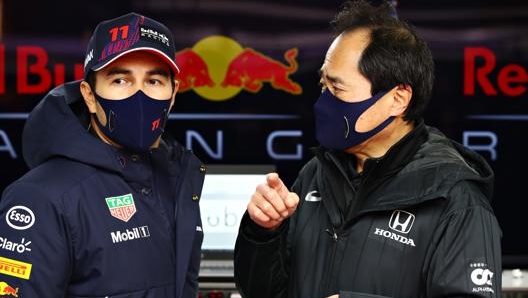 Sergio Perez (a sin) con Toyoharu Tanabe (Honda). Getty