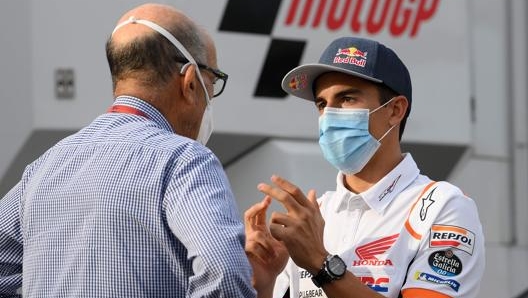 Marc Marquez con Carmelo Ezpeleta. Afp