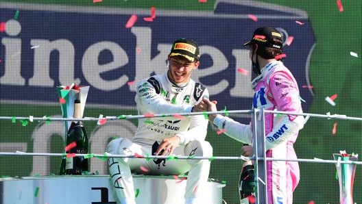 Pierre Gasly sul podio di Monza con Lance Stroll (3), dopo la vittoria del GP Italia. Getty