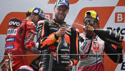 Il podio: da sinistra Bagnaia, Binder e Martin. Afp