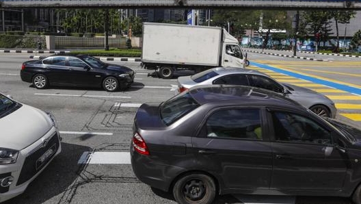 Traffico automobilistico a Kuala Lumpur in Malesia. Epa