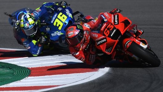 Joan Mir dietro Pecco Bagnaia a Portimao 2. Afp