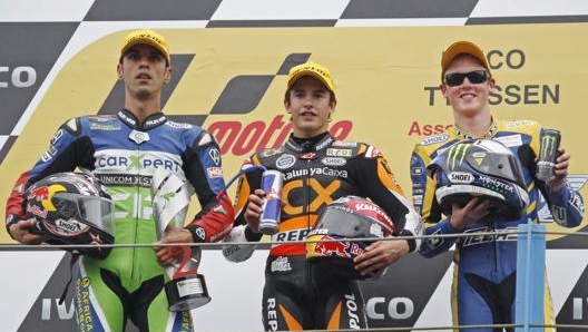 Sofuoglu con Marquez e Smith ad Assen nel 2011 in Moto2. Lapresse