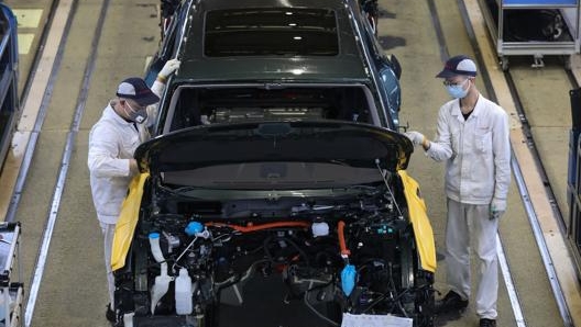 L’allenaza tra Dongfeng e Peugeot e Citroen ha portata alla vendita di oltre 100 mila veicoli. Afp